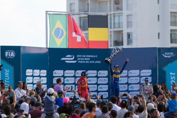 2015/2016 FIA Formula E Championship.
Punta del Este ePrix, Punta del Este, Uruguay.
Saturday 19 December 2015.
Sebastien Buemi (SUI), Renault e.Dams Z.E.15, Lucas Di Grassi (BRA), ABT Audi Sport FE01 and Jerome D'Ambrosio (FRA) Dragon Racing - Venturi VM200-FE-01 on the podium.
Photo: Zak Mauger/LAT/Formula E
ref: Digital Image _L0U9002