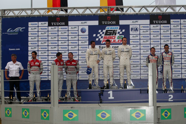 2014 World Endurance Championship,
Interlagos, Brazil. 28th - 30th November 2014.
LMP1 Podium (l-r) Lucas Di Grassi / Loic Duval / Tom Kristensen Audi Sport Team Joest Audi R18 e-tron quattro, Romain Dumas / Neel Jani / Marc Lieb Porsche AG Porsche 919 Hybrid, Anthony Davidson / Sebastien Buemi Toyota Racing Toyota TS 040 Hybrid.
World Copyright: Ebrey / LAT Photographic.