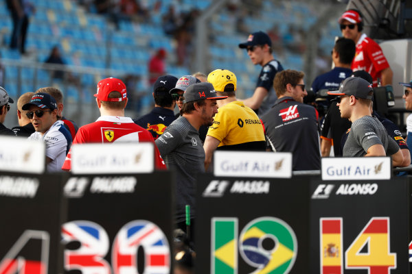 Bahrain International Circuit, Sakhir, Bahrain.
Sunday 16 April 2017.
faFernando Alonso, McLaren, and Stoffel Vandoorne, McLaren, with the other drivers during the drivers parade.
World Copyright: Glenn Dunbar/LAT Images
ref: Digital Image _X4I1008 Bahrain International Circuit, Sakhir, Bahrain.
Sunday 16 April 2017.
faFernando Alonso, McLaren, and Stoffel Vandoorne, McLaren, with the other drivers during the drivers parade.
World Copyright: Glenn Dunbar/LAT Images
ref: Digital Image _X4I1008