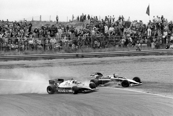 Nelson Piquet (BRA) Brabham BT52B (Right) heads into the tyre barrier at Tarzan after being hit by Alain Prost (FRA) Renault RE40 (Left) on lap 42 when Alain lost control whilst trying to overtake him. Piquet retired on the spot, Prost crashed out later that lap having suffered damage to the front wing.
Dutch Grand Prix, Rd 12, Zandvoort, Holland, 28 August 1983.
Nelson Piquet (BRA) Brabham BT52B (Right) heads into the tyre barrier at Tarzan after being hit by Alain Prost (FRA) Renault RE40 (Left) on lap 42 when Alain lost control whilst trying to overtake him. Piquet retired on the spot, Prost crashed out later that lap having suffered damage to the front wing.
Dutch Grand Prix, Rd 12, Zandvoort, Holland, 28 August 1983.