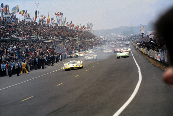 Le Mans, France. 14-15 June 1969.
Rolf Stommelen/Kurt Ahrens (#14 Porsche 917LH) leads Vic Elford/Richard Attwood (#12 Porsche 917LH), Jo Siffert/Brian Redman (#20 Porsche 908), Udo Schutz/Gerhard Mitter (#23 Porsche 908) and Jo Bonnier/Masten Gregory (#2 Lola T70 M3B-Chevrolet) at the start.
World Copyright: LAT Photographic
Ref: 69LM03 Le Mans, France. 14-15 June 1969.
Rolf Stommelen/Kurt Ahrens (#14 Porsche 917LH) leads Vic Elford/Richard Attwood (#12 Porsche 917LH), Jo Siffert/Brian Redman (#20 Porsche 908), Udo Schutz/Gerhard Mitter (#23 Porsche 908) and Jo Bonnier/Masten Gregory (#2 Lola T70 M3B-Chevrolet) at the start.
World Copyright: LAT Photographic
Ref: 69LM03