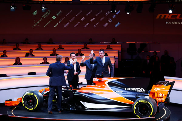 McLaren MCL32 Honda Formula 1 Launch.
McLaren Technology Centre, Woking, UK.
Friday 24 February 2017.
L-R: Presenter Simon Lazenby, Yusuke Hasegawa, Senior Managing Officer, Honda, Zak Brown, Executive Director of McLaren Technology Group, and Eric Boullier, Racing Director, McLaren, toast the MCL32.
World Copyright: Steven Tee/LAT Images
Ref: _O3I5013