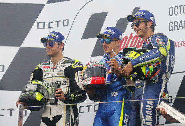 2016 MotoGP Championship. 
British Grand Prix. 
Silverstone, England. 2nd - 4th September 2016. 
Cal Crutchlow, LCR Honda, Maverick Vinales, Suzuki, and Valentino Rossi, Yamaha, on the podium. 
Ref: _W7_9589a. World copyright: Kevin Wood/LAT Photographic