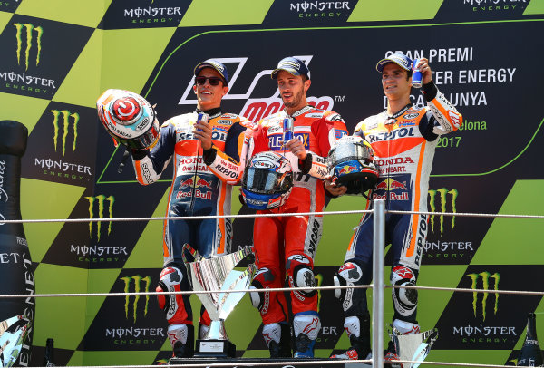 2017 MotoGP Championship - Round 7
Circuit de Catalunya, Barcelona, Spain
Sunday 11 June 2017
Podium: second placde Marc Marquez, Repsol Honda Team, Race winner Andrea Dovizioso, Ducati Team, third placeDani Pedrosa, Repsol Honda Team
World Copyright: Gold & Goose Photography/LAT Images
ref: Digital Image 677038 2017 MotoGP Championship - Round 7
Circuit de Catalunya, Barcelona, Spain
Sunday 11 June 2017
Podium: second placde Marc Marquez, Repsol Honda Team, Race winner Andrea Dovizioso, Ducati Team, third placeDani Pedrosa, Repsol Honda Team
World Copyright: Gold & Goose Photography/LAT Images
ref: Digital Image 677038