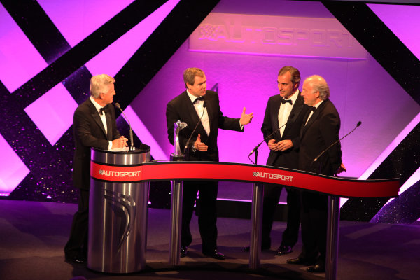 Grosvenor House Hotel, Park Lane, London 
4th December 2011 
David Richards and Dr Kay Segler accept the Rally Car of the Year award on behalf of the Mini John Cooper Works WRC from Carlos Sainz on the stage.
World Copyright: Glenn Dunbar/LAT Photographic 
ref: Digtal Image GD5D0279