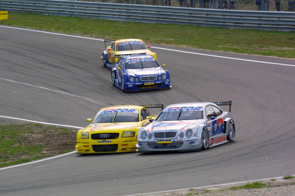 2001 DTM Championship
Zandvoort, Holland. 22nd - 23rd September 2001.
Mattias Ekstrom (Abt Audi TT-R) battles with Peter Dunbreck (Mercedes Benz CLK), with Patrick Huismann and Laurent Aielo, chasing.
World Copyright: Peter Spinney/LAT Photographic
ref: 8
5mb Digital Image Only