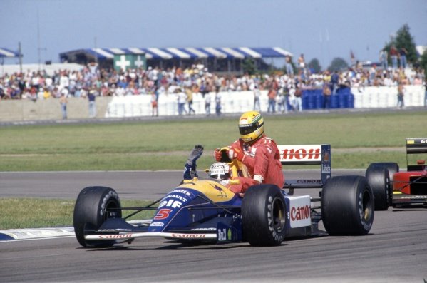 1991 British Grand Prix.
Silverstone, Great Britain. 14 July 1991.
Nigel Mansell, Williams FW14-Renault, 1st position, gives Ayrton Senna, McLaren MP4/6-Honda, 4th position, a lift back to the pits, action.
World Copyright: LAT Photographic
Ref: 35mm transparency 91GBR11 1991 British Grand Prix.
Silverstone, Great Britain. 14 July 1991.
Nigel Mansell, Williams FW14-Renault, 1st position, gives Ayrton Senna, McLaren MP4/6-Honda, 4th position, a lift back to the pits, action.
World Copyright: LAT Photographic
Ref: 35mm transparency 91GBR11