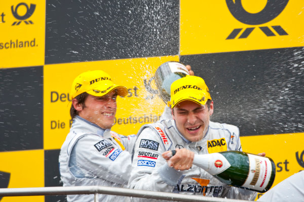 Dijon - Prenois, France. Sunday 11th October.
Gary Paffett (Salzgitter AMG Mercedes C-Klasse) celebrates his victory on the podium with team mate Bruno Spengler (Mercedes-Benz Bank AMG C-Klasse).
World Copyright: Alastair Staley/LAT Photographic.
Ref: _O9T0730
jpg Dijon - Prenois, France. Sunday 11th October.
Gary Paffett (Salzgitter AMG Mercedes C-Klasse) celebrates his victory on the podium with team mate Bruno Spengler (Mercedes-Benz Bank AMG C-Klasse).
World Copyright: Alastair Staley/LAT Photographic.
Ref: _O9T0730
jpg