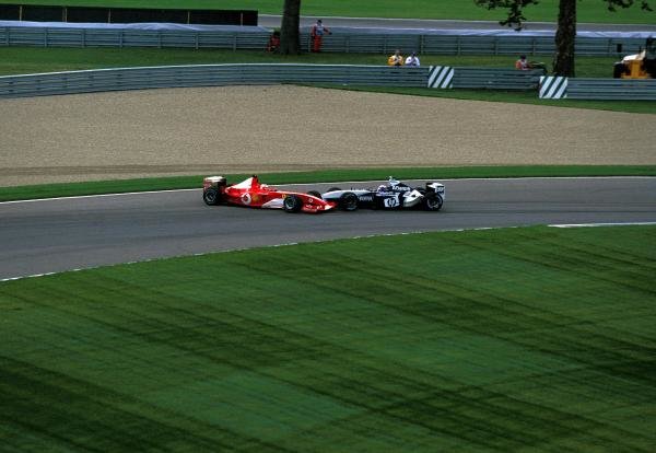 Juan Pablo Montoya (COL), BMW Williams FW25, and Rubens Barrichello (BRA), Ferrari F2003-GA, make contact on lap 3. Barrichello entered the gravel trap backwards and retired from the race while Montoya was handed a drive through penalty.
United States Grand Prix, Rd15, Indianapolis Motor Speedway, Indianapolis, USA. 28 September 2003.
BEST IMAGE Juan Pablo Montoya (COL), BMW Williams FW25, and Rubens Barrichello (BRA), Ferrari F2003-GA, make contact on lap 3. Barrichello entered the gravel trap backwards and retired from the race while Montoya was handed a drive through penalty.
United States Grand Prix, Rd15, Indianapolis Motor Speedway, Indianapolis, USA. 28 September 2003.
BEST IMAGE