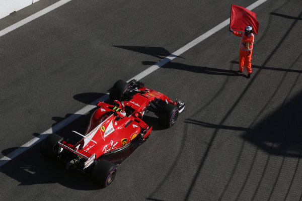 Sochi Autodrom, Sochi, Russia.
Friday 28 April 2017.
A marshal tries, unsuccessfully, to stop Kimi Raikkonen, Ferrari SF70H, from leaving the pit lane at the end of the session.
World Copyright: Coates/LAT Images
ref: Digital Image AN7T1150