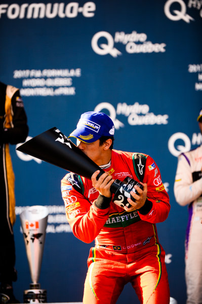 2016/2017 FIA Formula E Championship.
Round 12 - Montreal ePrix, Canada
Sunday 30 July 2017.
Lucas Di Grassi (BRA), ABT Schaeffler Audi Sport, Spark-Abt Sportsline, ABT Schaeffler FE02, celebrates on the podium.
Photo: Patrik Lundin/LAT/Formula E
ref: Digital Image PL2_1470