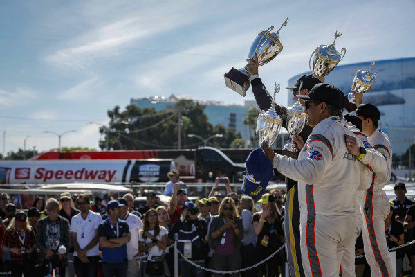 #5 Mustang Sampling Racing Cadillac DPi, DPi: Joao Barbosa, Filipe Albuquerque, #6 Acura Team Penske Acura DPi, DPi: Juan Pablo Montoya, Dane Cameron, #7 Acura Team Penske Acura DPi, DPi: Helio Castroneves, Ricky Taylor celebrate on the podium #5 Mustang Sampling Racing Cadillac DPi, DPi: Joao Barbosa, Filipe Albuquerque, #6 Acura Team Penske Acura DPi, DPi: Juan Pablo Montoya, Dane Cameron, #7 Acura Team Penske Acura DPi, DPi: Helio Castroneves, Ricky Taylor celebrate on the podium