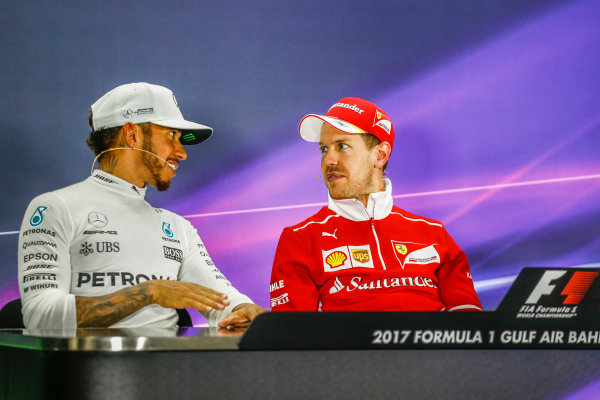 Bahrain International Circuit, Sakhir, Bahrain.
Sunday 16 April 2017.
All smiles between Lewis Hamilton, Mercedes AMG, 2nd Position, and Sebastian Vettel, Ferrari, 1st Position, in the Press Conference.
World Copyright: Sam Bloxham/LAT Images
ref: Digital Image _W6I3410 Bahrain International Circuit, Sakhir, Bahrain.
Sunday 16 April 2017.
All smiles between Lewis Hamilton, Mercedes AMG, 2nd Position, and Sebastian Vettel, Ferrari, 1st Position, in the Press Conference.
World Copyright: Sam Bloxham/LAT Images
ref: Digital Image _W6I3410