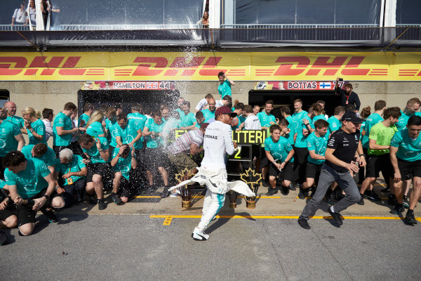 Circuit Gilles Villeneuve, Montreal, Canada.
Sunday 11 June 2017.
Lewis Hamilton, Mercedes AMG, 1st Position, Valtteri Bottas, Mercedes AMG, 2nd Position, and the Mercedes team celebrate victory.
World Copyright: Steve Etherington/LAT Images
ref: Digital Imagee SNE18675