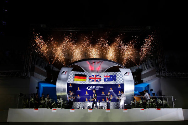Marina Bay Circuit, Singapore.
Sunday 21 September 2014.
Fireworks erupt as Lewis Hamilton, Mercedes AMG, 1st Position, Sebastian Vettel, Red Bull Racing, 2nd Position, and Daniel Ricciardo, Red Bull Racing, 3rd Position, celebrate on the podium.
World Copyright: Charles Coates/LAT Photographic.
ref: Digital Image _X5J7486 Marina Bay Circuit, Singapore.
Sunday 21 September 2014.
Fireworks erupt as Lewis Hamilton, Mercedes AMG, 1st Position, Sebastian Vettel, Red Bull Racing, 2nd Position, and Daniel Ricciardo, Red Bull Racing, 3rd Position, celebrate on the podium.
World Copyright: Charles Coates/LAT Photographic.
ref: Digital Image _X5J7486