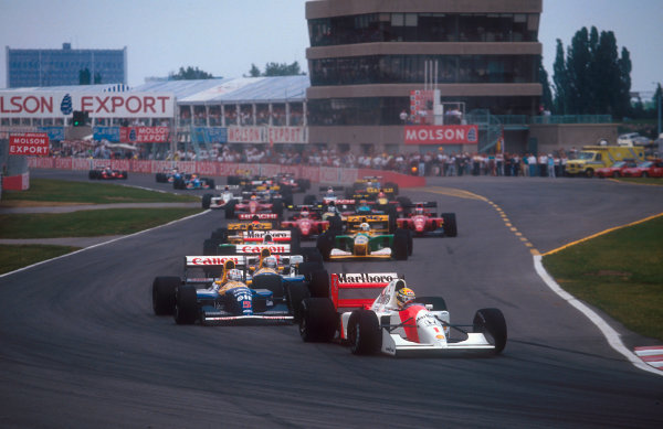 1992 Canadian Grand Prix.
Montreal, Quebec, Canada.
12-14 June 1992.
Ayrton Senna (McLaren MP4/7A Honda) leads Nigel Mansell, Riccardo Patrese (both Williams FW14B Renault), Gerhard Berger (McLaren MP4/7A Honda), Michael Schumacher and Martin Brundle (both Benetton B192 Ford's) at the start.
Ref-92 CAN 01.
World Copyright - LAT Photographic
1992 Canadian Grand Prix.
Montreal, Quebec, Canada.
12-14 June 1992.
Ayrton Senna (McLaren MP4/7A Honda) leads Nigel Mansell, Riccardo Patrese (both Williams FW14B Renault), Gerhard Berger (McLaren MP4/7A Honda), Michael Schumacher and Martin Brundle (both Benetton B192 Ford's) at the start.
Ref-92 CAN 01.
World Copyright - LAT Photographic