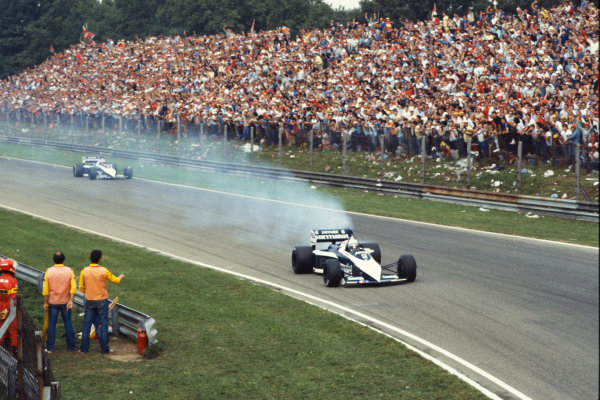 1983 Italian Grand Prix 
Monza, Italy. 9-11 September 1983. 
Riccardo Patrese, Brabham BT52B BMW, retired, with smoking engine, ahead of team-mate and race winner Nelson Piquet. 
Ref: 83ITA12. World Copyright: LAT Photographic
