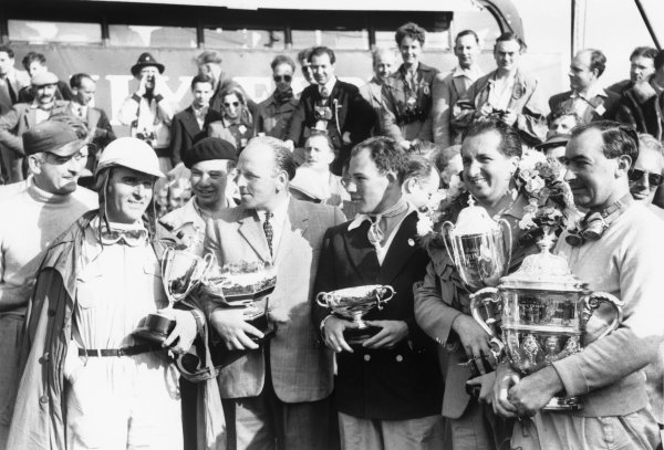 Silverstone, England. 16 - 18 July 1953.
L_R: Giuseppe Farina, Reg Parnell, Stirling Moss, Alberto Ascari, and Ken Wharton with their winning trophies from the weekends races, portrait.
World Copyright: LAT Photographic.
Ref: 53 - 72 - 35A. Silverstone, England. 16 - 18 July 1953.
L_R: Giuseppe Farina, Reg Parnell, Stirling Moss, Alberto Ascari, and Ken Wharton with their winning trophies from the weekends races, portrait.
World Copyright: LAT Photographic.
Ref: 53 - 72 - 35A.