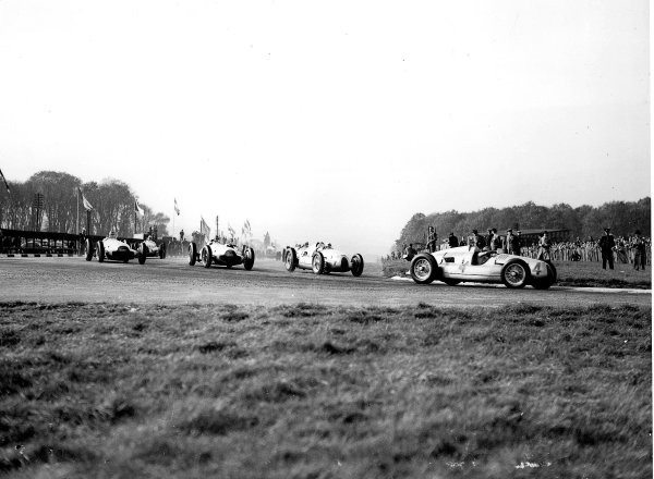 Donington Park, Great Britain.
22 October 1938.
Tazio Nuvolari leads Hermann Muller (both Auto Union D-typ), Manfred von Brauchitsch and Dick Seaman (both Mercedes-Benz W154) at the start. They finished in 1st, 4th, 5th and 3rd positions respectively.
Published-Autocar 28/10/1938 p856. Ref-C16132.
World Copyright - LAT Photographic Donington Park, Great Britain.
22 October 1938.
Tazio Nuvolari leads Hermann Muller (both Auto Union D-typ), Manfred von Brauchitsch and Dick Seaman (both Mercedes-Benz W154) at the start. They finished in 1st, 4th, 5th and 3rd positions respectively.
Published-Autocar 28/10/1938 p856. Ref-C16132.
World Copyright - LAT Photographic
