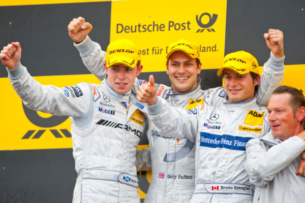 Dijon - Prenois, France. Sunday 11th October. 
Gary Paffett (Salzgitter AMG Mercedes C-Klasse) celebrates his victory on the podium with Paul Di Resta (AMG Mercedes C-Klasse) and Bruno Spengler (Mercedes-Benz Bank AMG C-Klasse). 
World Copyright: Alastair Staley/LAT Photographic.
Ref: _O9T0748
jpg