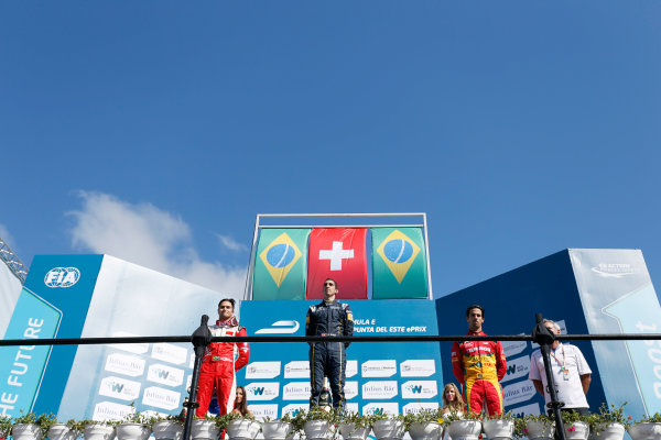 2014 FIA Formula E Championship.
Punta del Este ePrix, Uruguay.
Podium. Sebastien Buemi (SWI)/E.dams Renault - Spark-Renault SRT_01E (first position), Nelson Piquet Jr (BRA)/China Racing - Spark-Renault SRT_01E (second position) and Lucas di Grassi (BRA)/Audi Abt Sport - Spark-Renault SRT_01E (third position).
Photo: Zak Mauger/LAT/FE
ref: Digital Image _L0U1868 2014 FIA Formula E Championship.
Punta del Este ePrix, Uruguay.
Podium. Sebastien Buemi (SWI)/E.dams Renault - Spark-Renault SRT_01E (first position), Nelson Piquet Jr (BRA)/China Racing - Spark-Renault SRT_01E (second position) and Lucas di Grassi (BRA)/Audi Abt Sport - Spark-Renault SRT_01E (third position).
Photo: Zak Mauger/LAT/FE
ref: Digital Image _L0U1868