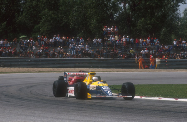 1990 San Marino Grand Prix.
Imola, Italy.
11-13 May 1990.
Riccardo Patrese (Williams FW13B Renault) heads Nigel Mansell (Ferrari 641) in the battle for 2nd place early on.
Ref-90 SM 10.
World Copyright - LAT Photographic

