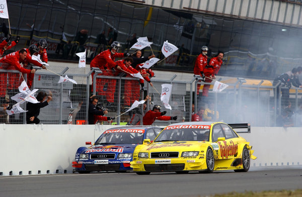 2004 DTM Championship
Brno,Czech Republic. 18th - 19th September.
Winner Mattias Ekstrom (Abt Sportsline Audi A4) lights up his rear tyres as he and teammate Tom Kristensen (Abt Sportsline Audi A4) cross the line to the cheers of their team. Action
World Copyright: Andre Irlmeier/LAT Photographic
ref: Digital Image Only 2004 DTM Championship
Brno,Czech Republic. 18th - 19th September.
Winner Mattias Ekstrom (Abt Sportsline Audi A4) lights up his rear tyres as he and teammate Tom Kristensen (Abt Sportsline Audi A4) cross the line to the cheers of their team. Action
World Copyright: Andre Irlmeier/LAT Photographic
ref: Digital Image Only