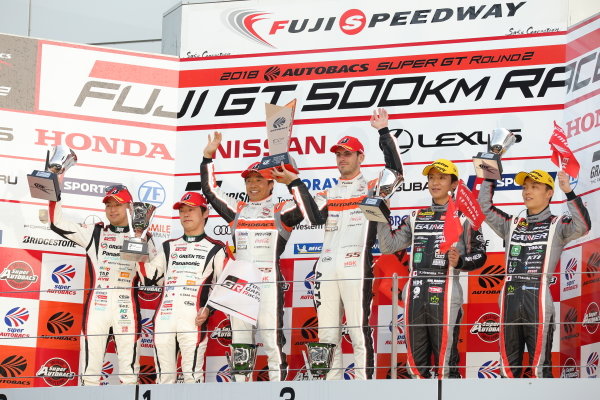 The GT300 winning drivers of the Arta (Autobas Racing Team Aguri) BMW M6 GT3, Shinichi Takagi & Sean Walkinshaw, celebrate on the podium. The second placed Koki Saga & Kohei Hirate, Toyota Prius apr GT, also celebrate, along with Katsuyuki Hiranaka & Hironobu Yasuda of the third position Gainer Tanax Nissan GT-R. The GT300 winning drivers of the Arta (Autobas Racing Team Aguri) BMW M6 GT3, Shinichi Takagi & Sean Walkinshaw, celebrate on the podium. The second placed Koki Saga & Kohei Hirate, Toyota Prius apr GT, also celebrate, along with Katsuyuki Hiranaka & Hironobu Yasuda of the third position Gainer Tanax Nissan GT-R.