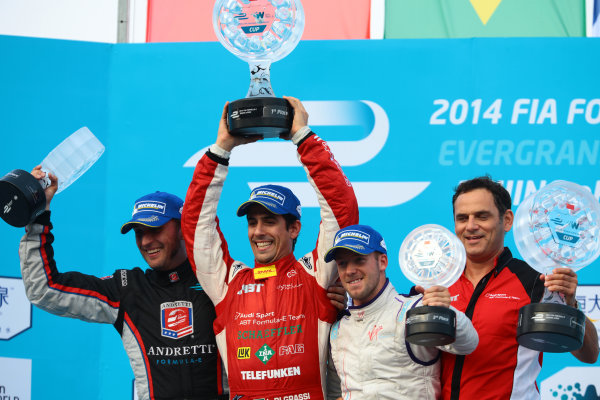 FIA Formula E - Podium
Beijing E-Prix, China
Saturday 13 September 2014.
Lucas di Grassi (Abt) celebrates with Franck Montagny (Andretti) and Sam Bird (Virgin) on the podium after winning the race.
Photo: Malcolm Griffiths/LAT/ Formula E
ref: Digital Image F80P2493 FIA Formula E - Podium
Beijing E-Prix, China
Saturday 13 September 2014.
Lucas di Grassi (Abt) celebrates with Franck Montagny (Andretti) and Sam Bird (Virgin) on the podium after winning the race.
Photo: Malcolm Griffiths/LAT/ Formula E
ref: Digital Image F80P2493