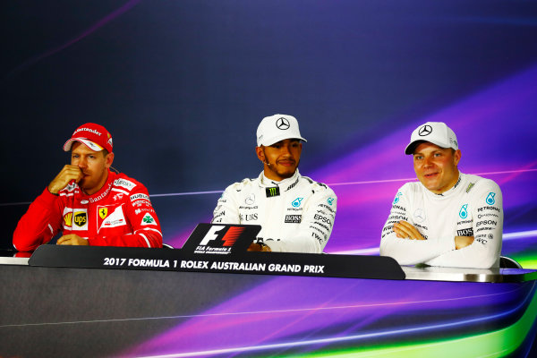 Albert Park, Melbourne, Australia.
Saturday 25 March 2017.
The post qualifying press conference. L-R: Sebastian Vettel, Ferrari, Lewis Hamilton, Mercedes AMG, and Valtteri Bottas, Mercedes AMG. 
World Copyright: Sam Bloxham/LAT Images
ref: Digital Image _J6I3565